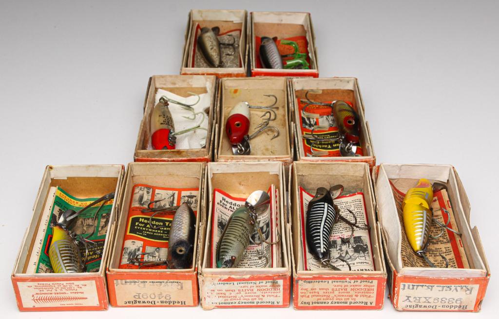 GROUP OF 10 HEDDON RIVER RUNT SPOOK BAIT LURES.: First half, 20th century. Group of ten Heddon River Runt Spook lures. Group includes River Runt Sinkers and River Runt Floaters. All are in original boxes, most with paper inserts. 3.25" long.