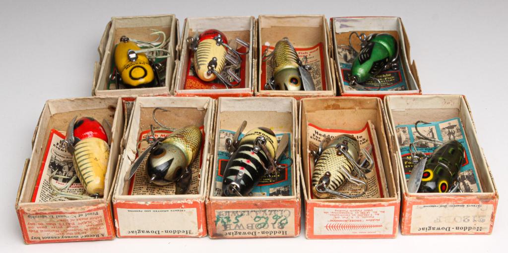GROUP OF NINE HEDDON BAIT CRAZY CRAWLER LURES.: American, first half 20th century. Group of nine Heddon Crazy-Crawler lures. All are in original boxes with paper inserts.