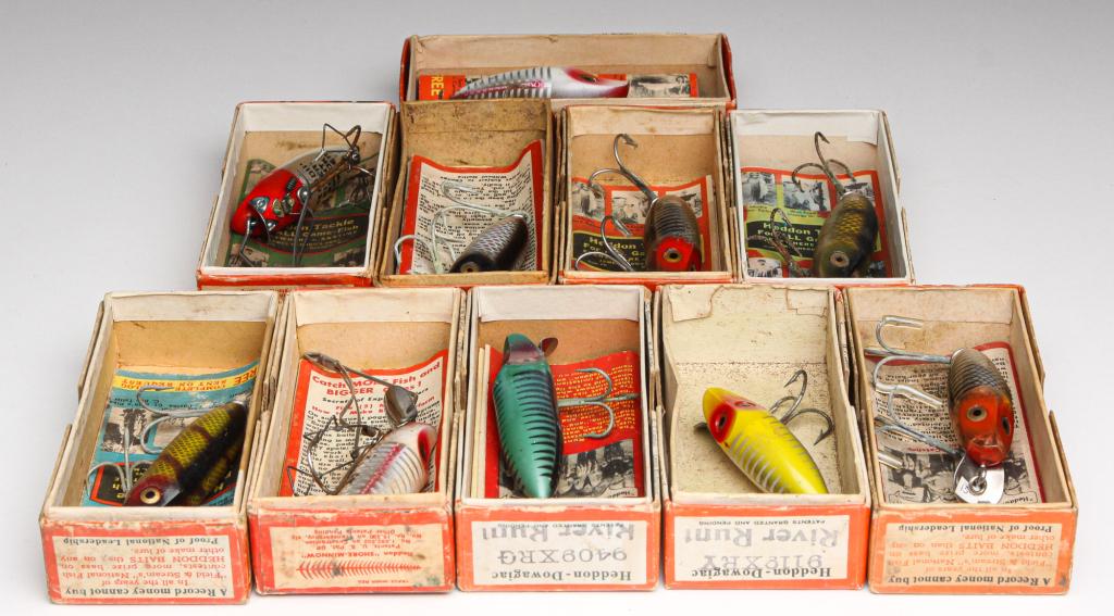 GROUP OF 10 HEDDON RIVER RUNT SPOOK BAIT LURES.: First half, 20th century. Group of ten Heddon River Runt Spook lures. Group includes River Runt Sinkers and River Runt Floaters. All are in original boxes with paper inserts. 3.25" long.