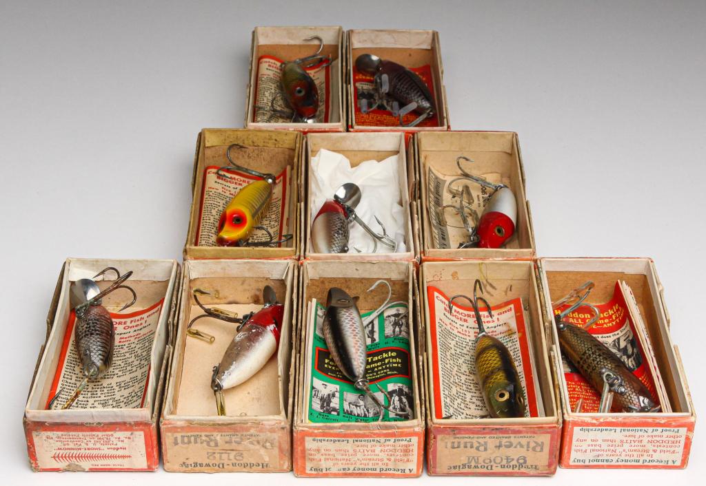 GROUP OF 10 HEDDON RIVER RUNT SPOOK BAIT LURES.: First half, 20th century. Group of ten Heddon River Runt Spook lures. Group includes River Runt Sinkers and River Runt Floaters. All are in original boxes, most with paper inserts.