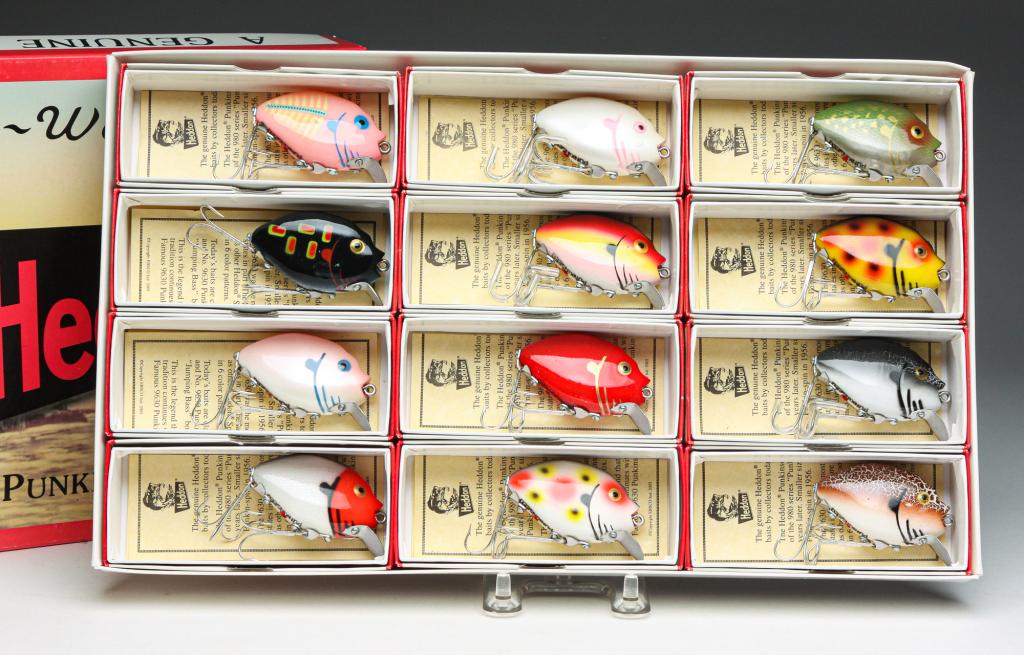 LIMITED RUN OF 12 HEDDON PUNKINSEED 9630 LURES.: Group of twelve Heddon Punkinseed 9630 2nd lures in limited production jumping bass box. All have original boxes with paper inserts.