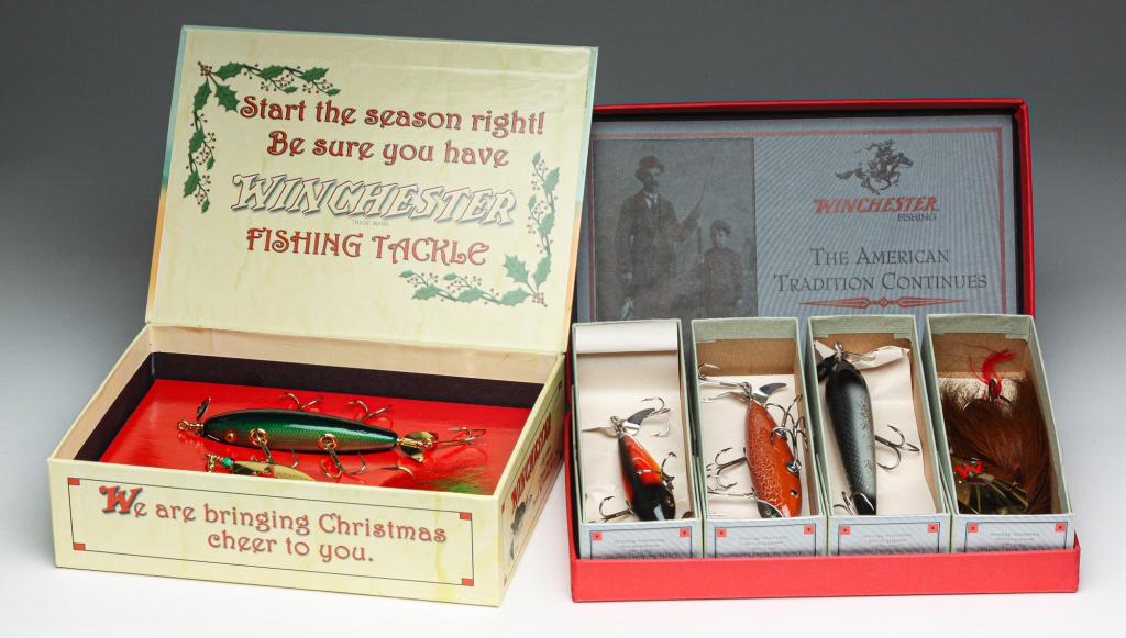 TWO SETS OF LIMITED EDITION WINCHESTER LURES.: Two sets of limited edition Winchester lures. Includes a 2001 Christmas set containing two limited edition lures. Along with a 2006 set containing a White Scale 9010, a Brown Crackleback 9210, a Black