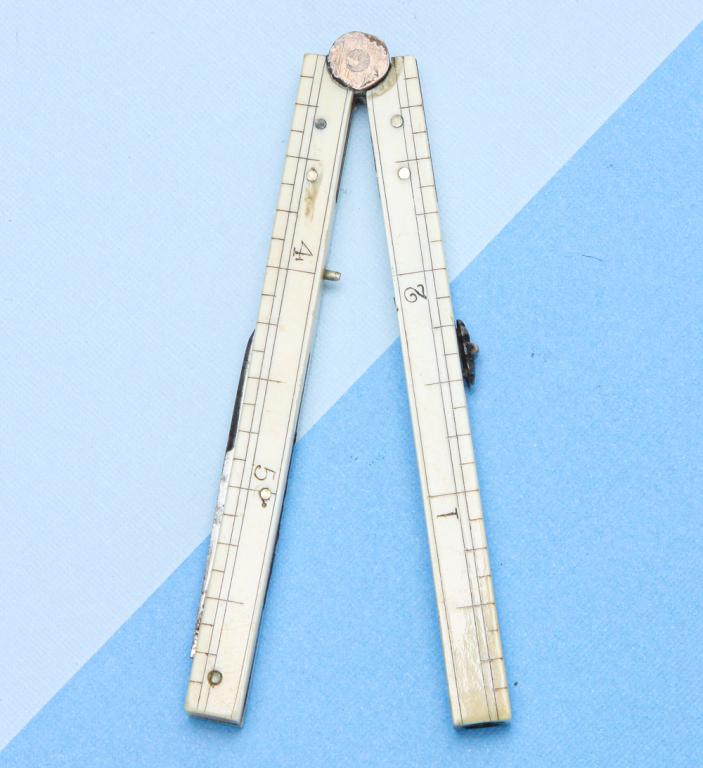 VINTAGE RETRACTABLE PENCIL/KNIFE/FOLDING RULER.: Late 19th - early 20th century. Extending 6" ruler (appears to be either ivory or bone) with retracting pencil and folding pen knife. Designed with two extending sections to form a 6" ruler, one end s