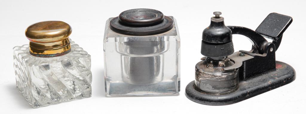 THEO. ALTENEDER, SENGBUSCH & ONE MORE INK WELL.: First half - 20th century. Theo. Alteneder & Sons cast iron drafting inkwell and bottle, label worn but legible, ca. 1930, approx. 5"l x 3.5"h. Heavy glass Sengbusch Self-Closing Inkstand, Pat. 1903, 