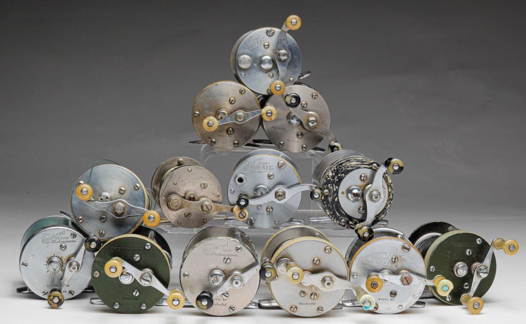 THIRTEEN BAIT CAST FISHING REELS.: Mid 20th century. Plastic spacers and knobs including bakelite. Shakespeare "Marhoff", "Supra", "Professional", "President", "Wondereel Deluxe", "Professional Sportcast", two "Tru-Axis Deluxe", "Stand