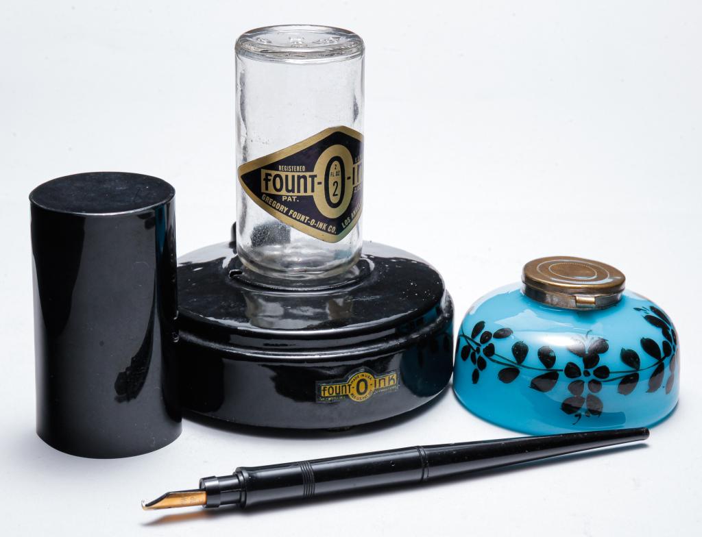'FOUNT-O-LINK' INKWELL & OPAQUE GLASS INKWELL.: First half - 20th century. Two inkwells comprised of: 1930's Gregory 'Fount-O-Ink' glass and ceramic inkwell with dipping pen (nib tip is bent). The ink bottle is covered with a cylindrical plastic co