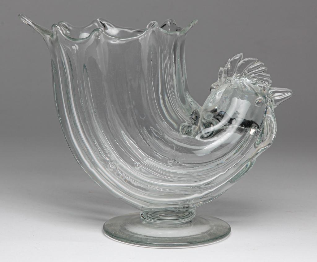 AMERICAN PILLAR MOLD ROOSTER SPOONER.: Late 19th century. Clear blown glass rooster with scalloped edge. 7.5"h. Ex Greg Kramer, (Pennsylvania).