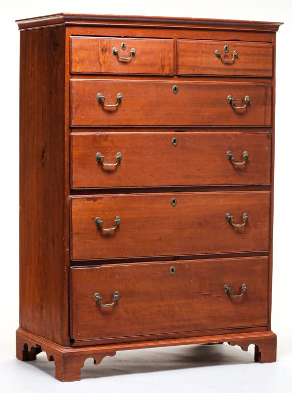 AMERICAN CHIPPENDALE TALL CHEST.: Fourth quarter 18th century, poplar. Applied molding around top, two over four dovetailed overlapping drawers, solid ends and replaced bracket feet. Refinished with repairs and two replaced sections o