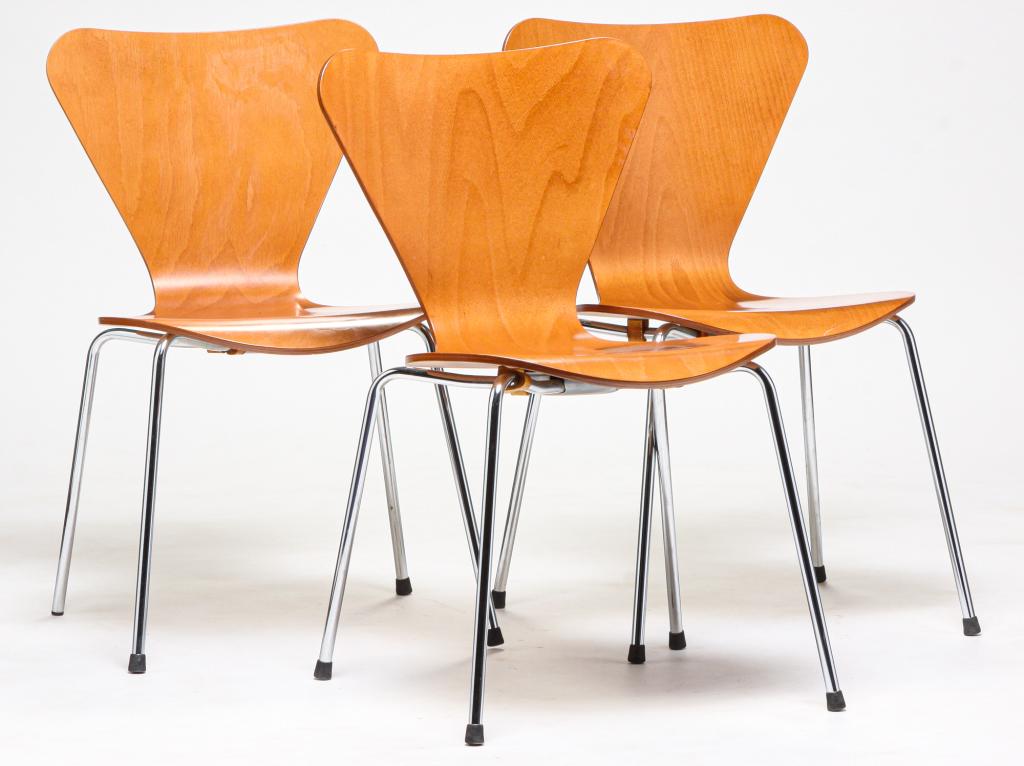 THREE ITALIAN FRITZ HANSEN STYLE CHAIRS.: Late 20th century. Laminate whale tail side chairs marked "Made in Italy". Minor wear. 17" seat, 31"h.