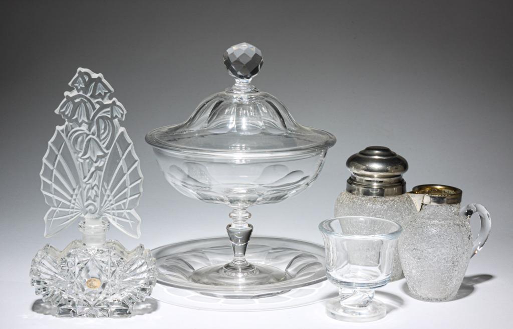 FIVE PIECES OF GLASS.: Twentieth century. A Steuben footed vase, 3"h. A Czech perfume bottle, 8.25"h. Over-shot jar and creamer with silver-plated mounts, 4.5"h. and 3.75"h. A paneled cut lidded compote and under plate, 8.5
