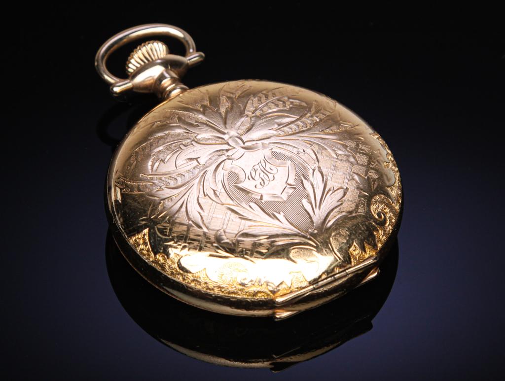 HAMILTON RAILROAD POCKET WATCH.: Ca. 1900. 16 size, 21 jewels, adjusted to five positions. Serial number 807218. Gold-filled case, monogrammed, minor wear. PLEASE NOTE: watches are not guaranteed to be in working condition.