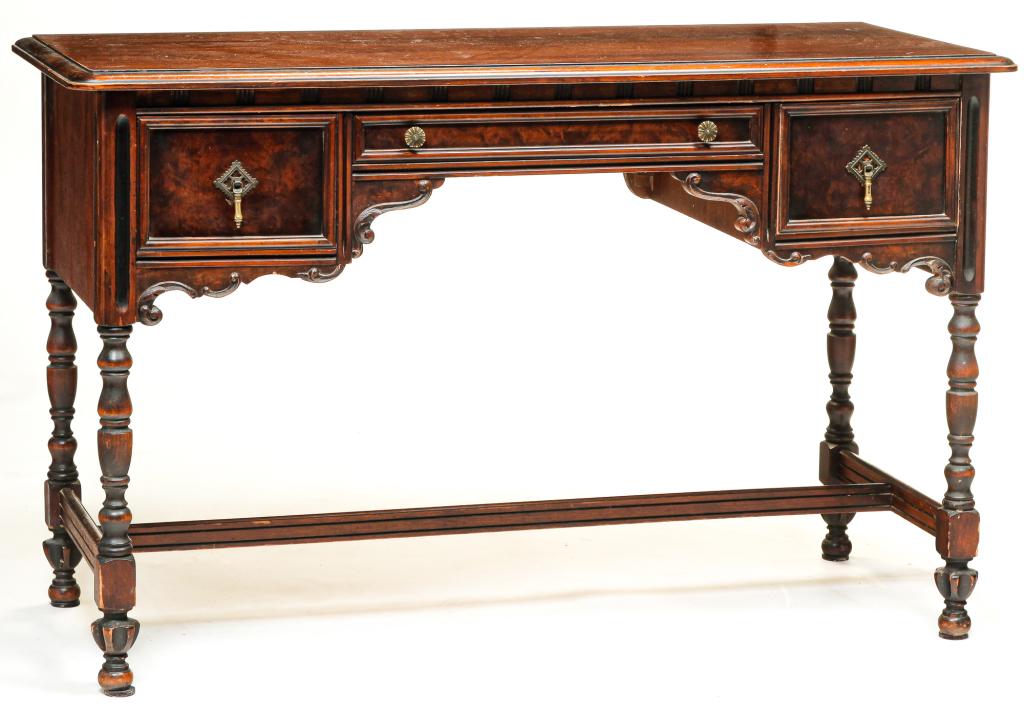 AMERICAN RENIASSANCE REVIVAL DESK.: Second quarter 20th century, mahogany. Three dovetailed drawers, turned legs and "H" stretcher. 29.5"h. 48"w. 19.5"d.