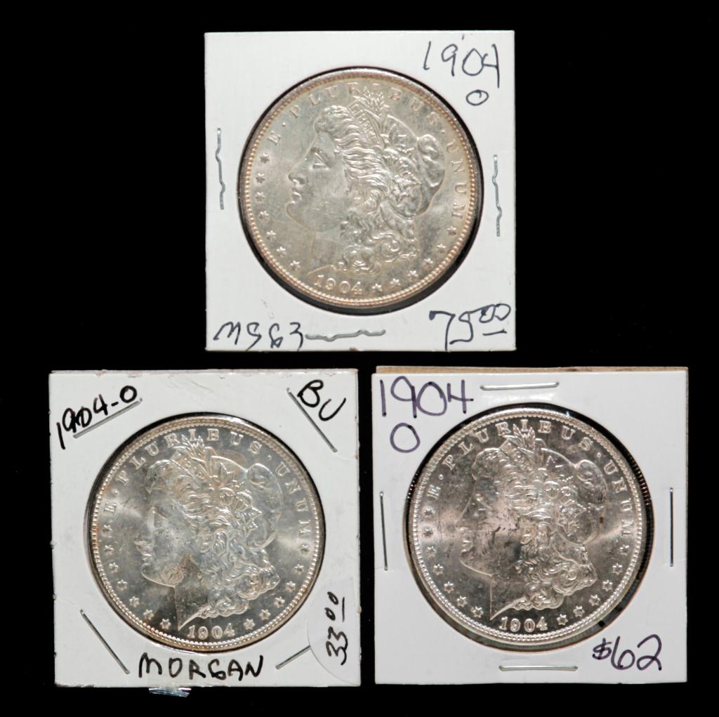 THREE 1904-O BU MORGAN SILVER DOLLARS (1 of 2)