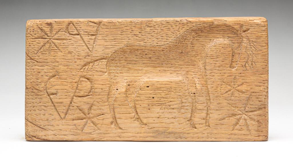 AMERICAN BUTTER OR COOKIE MOLD.: Nineteenth century, oak. Double sided with initials "FP" and deer and compass stars. One side also has a hunter with rifle. Minor edge loss. 4.25"h. 8.75"l.