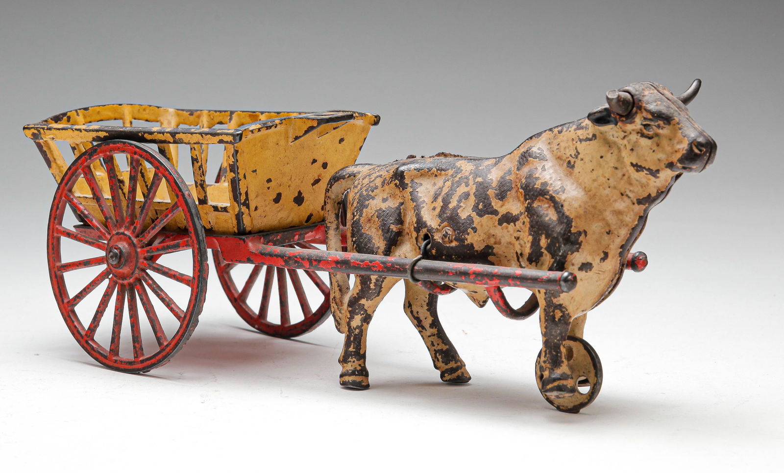 AMERICAN CAST IRON OX CART TOY. (1 of 4)