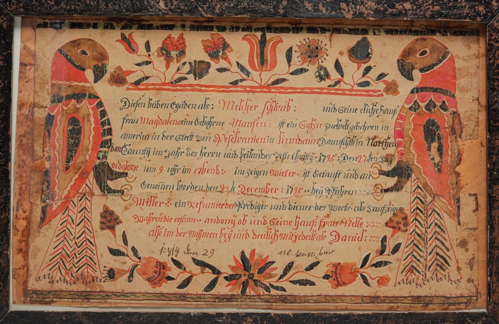 FRAKTUR ATTRIBUTED TO THE GILBERT FAMILY.: Probably Peter Gilbert, watercolor and ink on paper. Parrots and tulips surround text recording the October 27, 1795 birth of a son to Melcher and Magdalena Schwab in Northampton County, Pennsylvania.