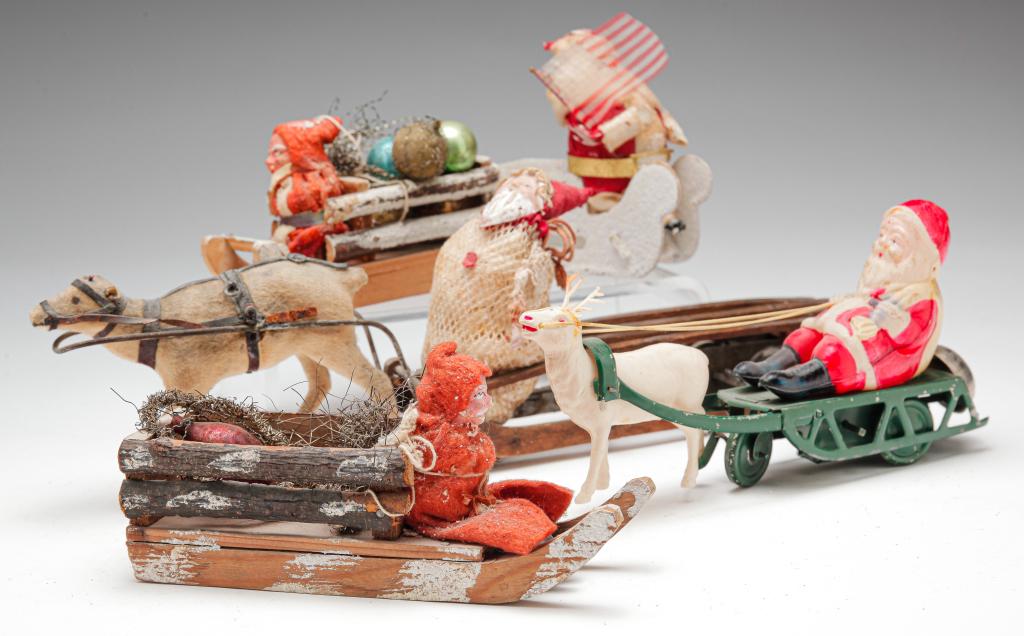 FIVE SANTAS WITH SLEDS AND SLEIGHS. (1 of 5)