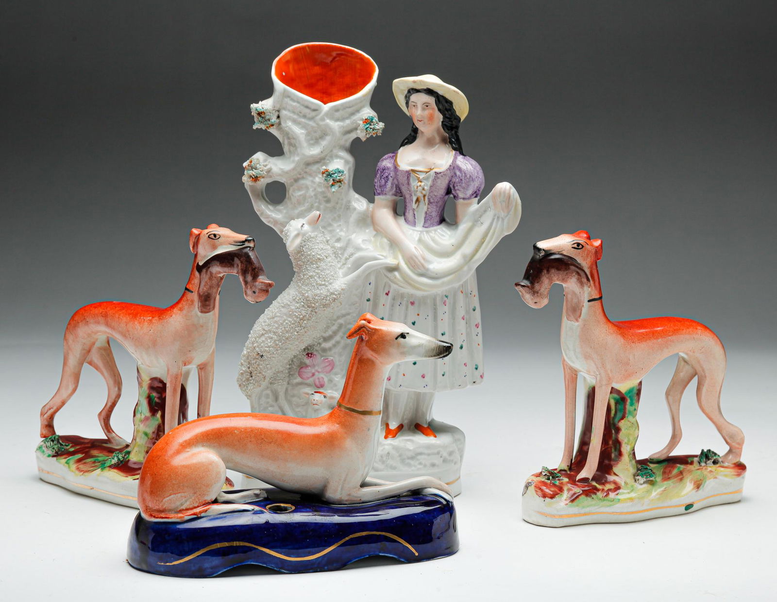 FOUR ENGLISH STAFFORDSHIRE FIGURINES. (1 of 6)