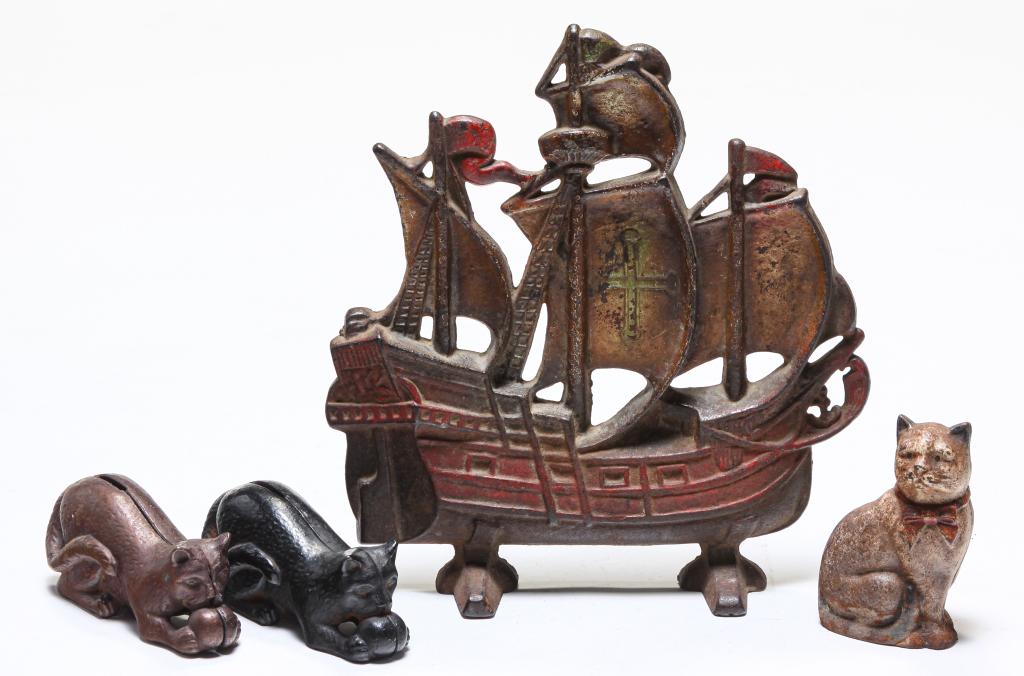 AMERICAN DOOR STOP AND THREE CAT BANKS. (1 of 5)