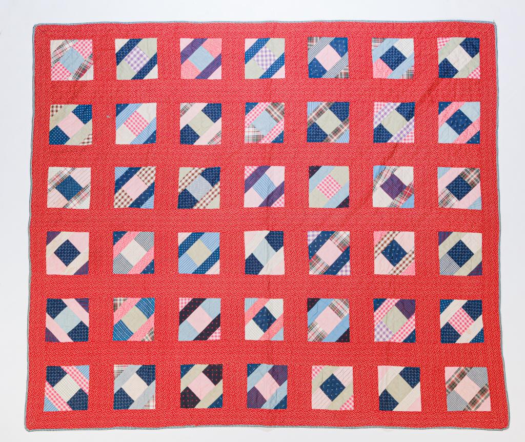 AMERICAN PIECED SQUARE VARIANT QUILT. (1 of 2)