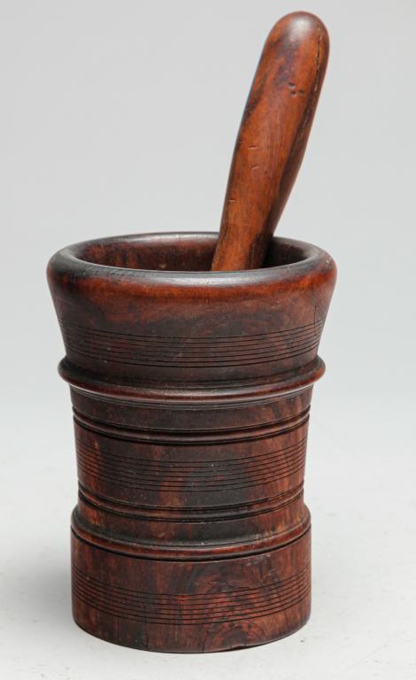 TREENWARE MORTAR AND PESTLE.: American or European, 2nd half 19th century. Turned lignum vitae. Some age splits. 6.5"h.