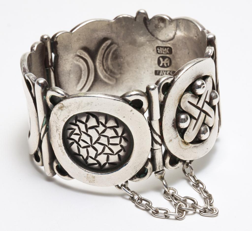 HECTOR AGUILAR AZTEC METAL SYMBOLS CUFF. (1 of 3)