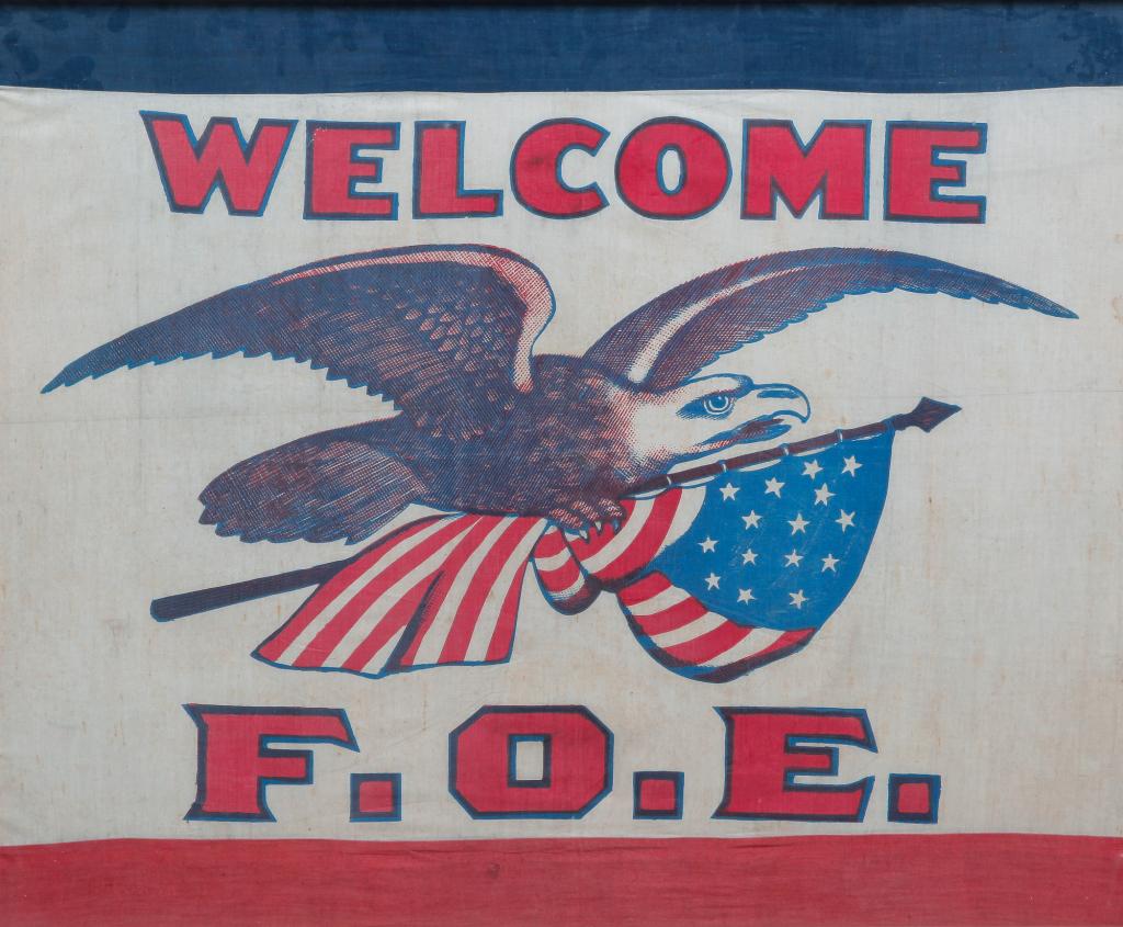 FRAMED PRINTED EAGLES FLAG. (1 of 3)