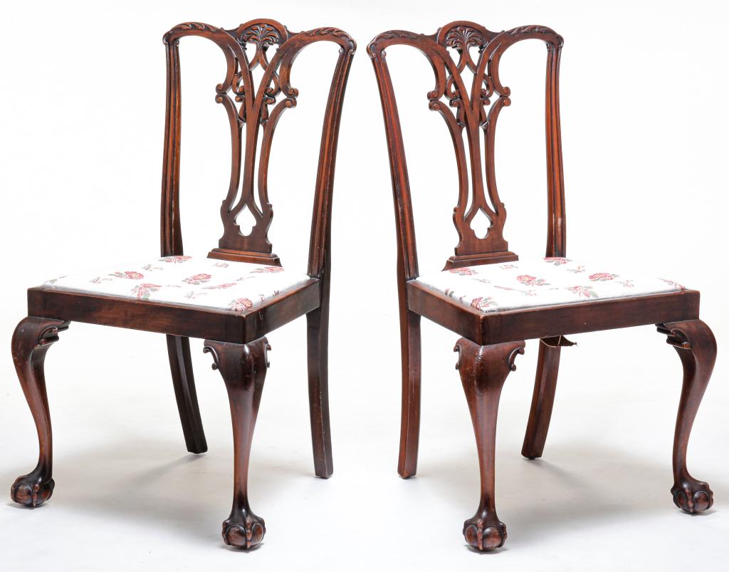 PAIR OF CHIPPENDALE STYLE SIDE CHAIRS.: Late 19th century, mahogany. Carved crests and pierced back splats, cabriole legs with ball-and-claw feet and slip seats. Refinished, 19" seat ht. 39"h.