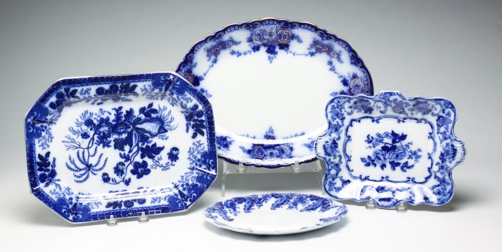 FOUR ENGLISH FLOW BLUE PLATTERS. (1 of 8)