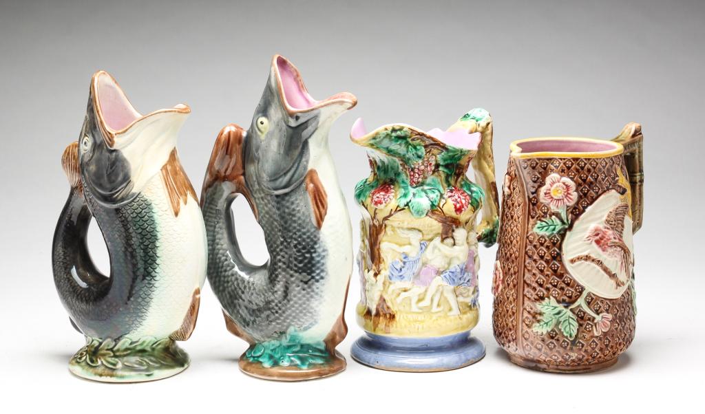 FOUR MAJOLICA PITCHERS. (1 of 4)
