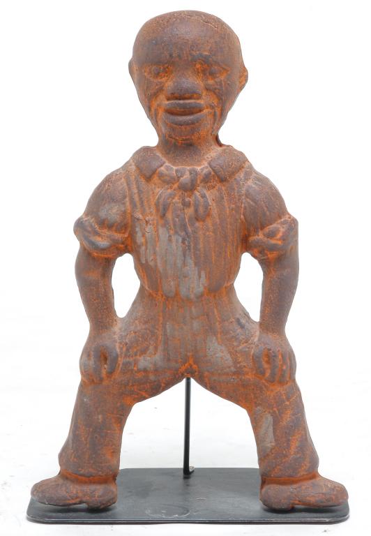 CAST IRON AFRICAN AMERICAN FIGURE. (1 of 3)