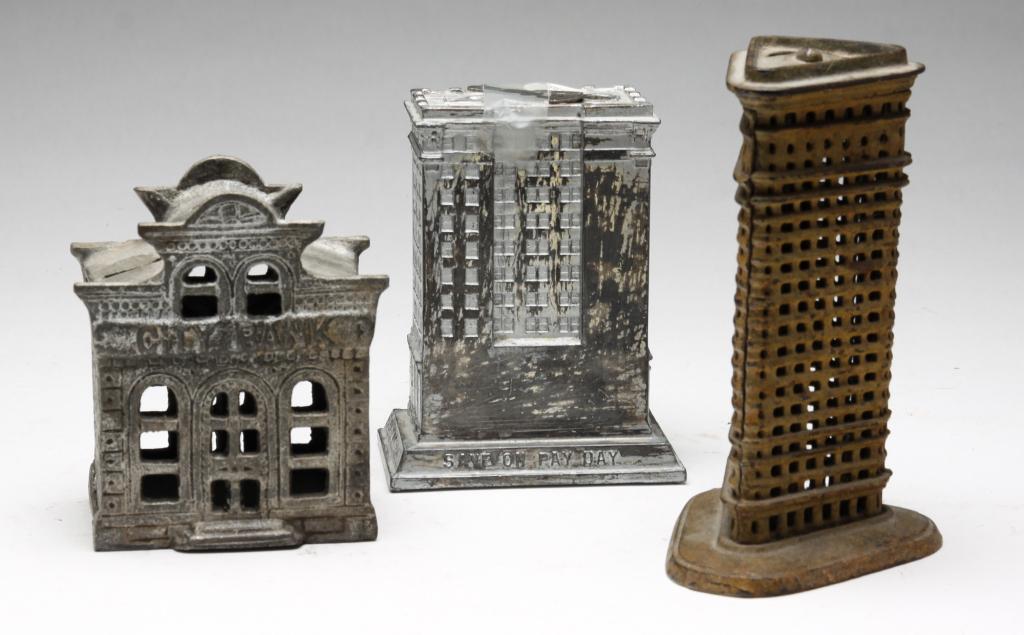 THREE METAL BUILDING BANKS. (1 of 4)
