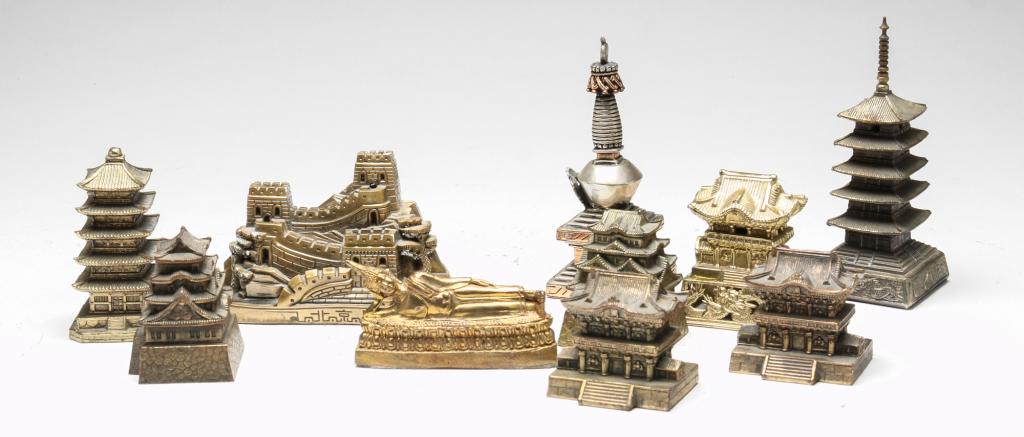 TEN EASTERN MONUMENT FIGURINE SOUVENIRS.: Twentieth century. Featuring a reclining Buddha, pagodas, palaces, and The Great Wall of China. Varying wear. Sizes range from 5.25"h - 2"h.