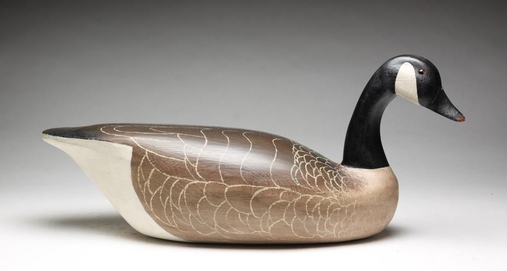 AMERICAN CARVED AND PAINTED GOOSE DECOY. (1 of 5)