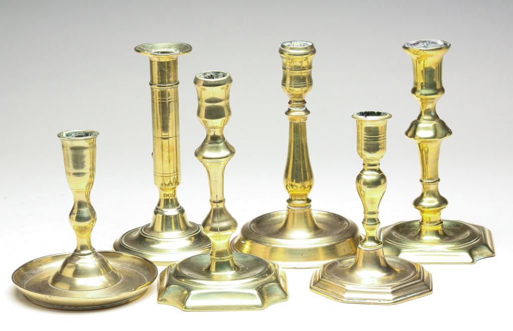 SIX EUROPEAN BRASS CANDLE STICKS. (1 of 3)