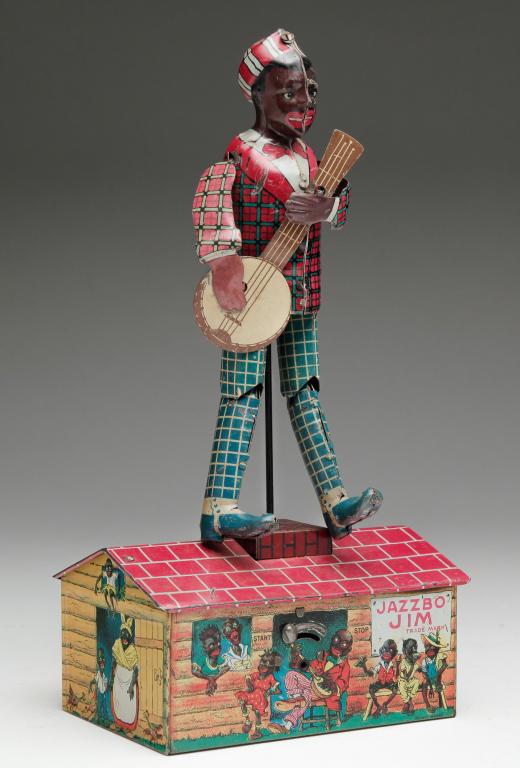 UNIQUE ART MFG. XO. DANCING TIN TOY. (1 of 4)