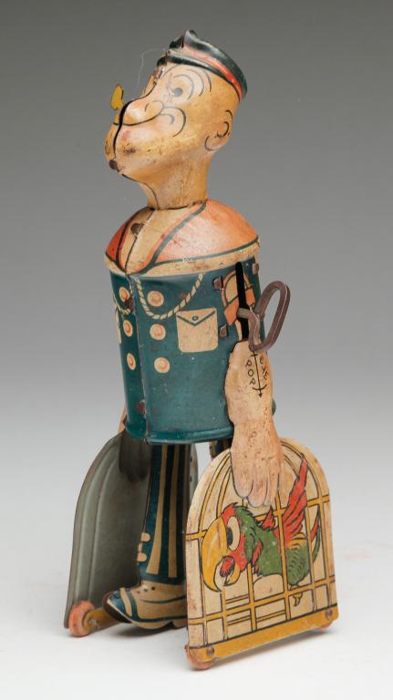 MARX "POPEYE WITH PARROT" TIN TOY.: First half 20th century, lithograph on tin, some wear. Works but sluggish. 8.25"h.