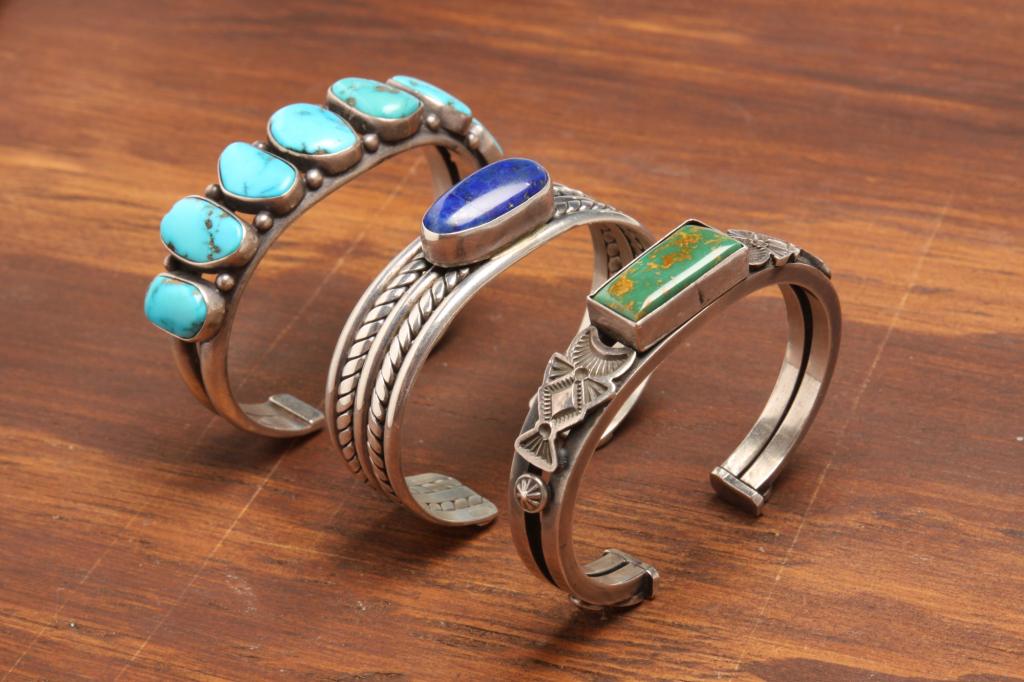 THREE VINTAGE NATIVE AMERICAN SILVER BANGLES. (1 of 3)