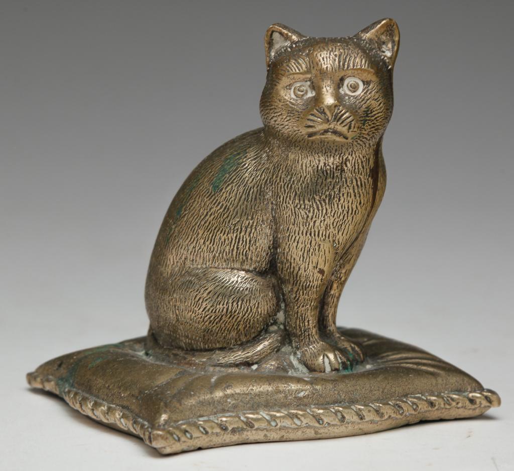 AMERICAN CAST BRASS PAPERWEIGHT. (1 of 3)