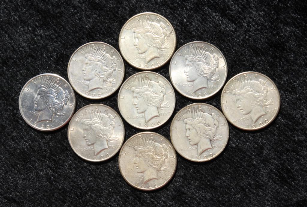 GROUP OF NINE 1922 SILVER PEACE DOLLARS. (1 of 2)