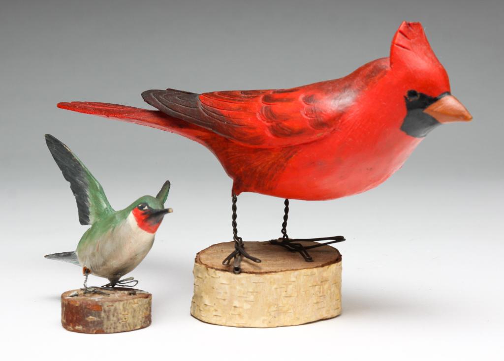 CARDINAL AND HUMMINGBIRD BY HAZELL TYRRELL.: Canton, New York, 1894-1967. Signed and titled on undersides. Carved wood with original paint and wire legs on a birch bases. Cardinal has minor damage to crest and split in tail. 4.5"h. 7.5"l. Hummin