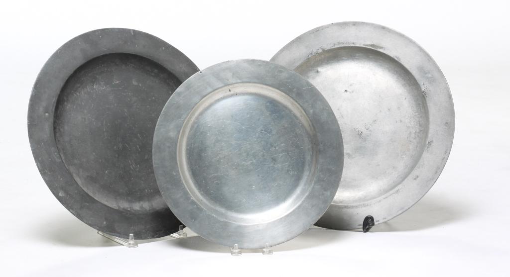 THREE PEWTER CHARGERS. (1 of 5)