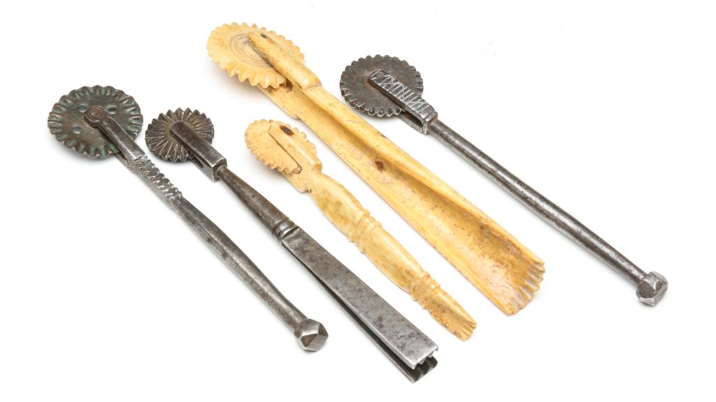FIVE AMERICAN PIE CRIMPERS.: Second half 19th century. Two inscribed bone and three wrought steel with some tooling, and one copper wheel. 5" to 6.5"l.