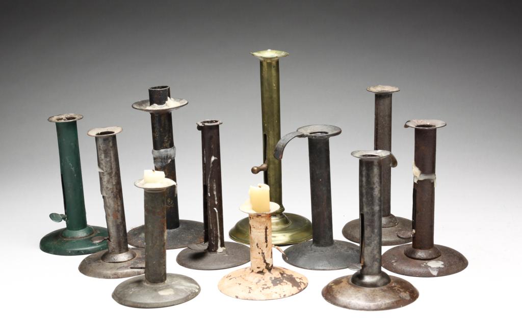 ELEVEN HOGSCRAPER CANDLESTICKS. (1 of 5)