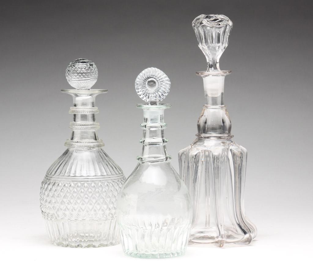THREE AMERICAN GLASS DECANTERS. (1 of 4)