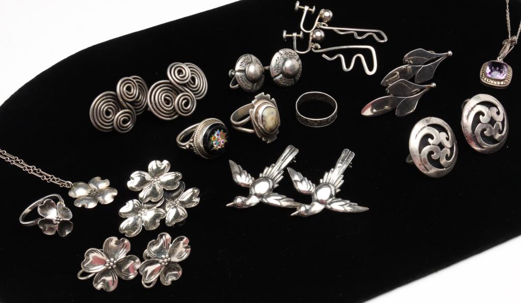 GROUP OF MOSTLY STERLING VINTAGE JEWELRY.: Mid-late 20th century. Group includes: five pairs of screw back non-pierced earrings, two pairs marked Taxco; pair of bird brooches; marcasite necklace with purple stone; three rings - one with mosaic