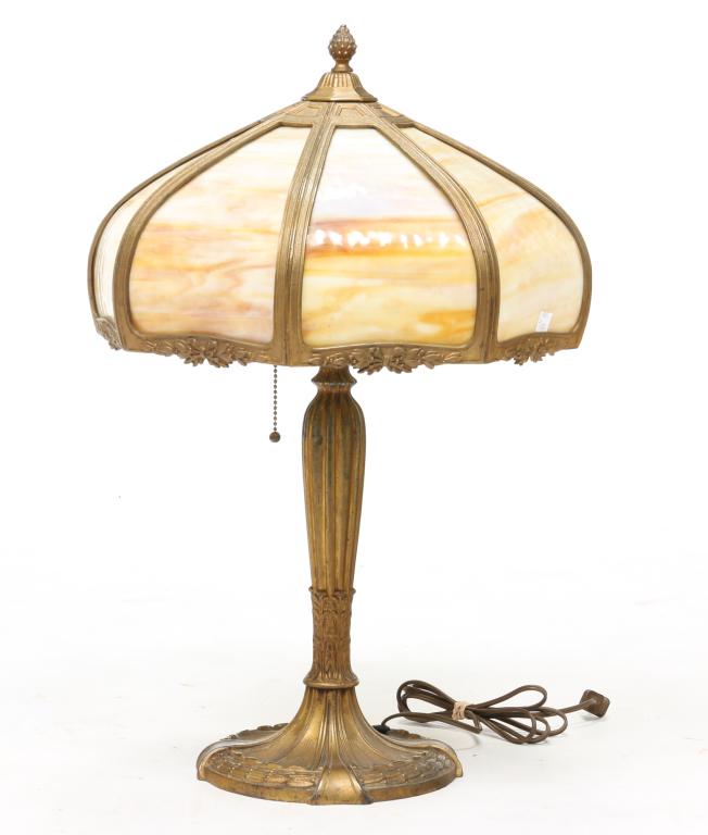 SLAG GLASS TABLE LAMP.: American, 20th century. Classic designed base with worn gold paint. Eight panel curved slag glass shade. 23.5"h. 14.5"w.