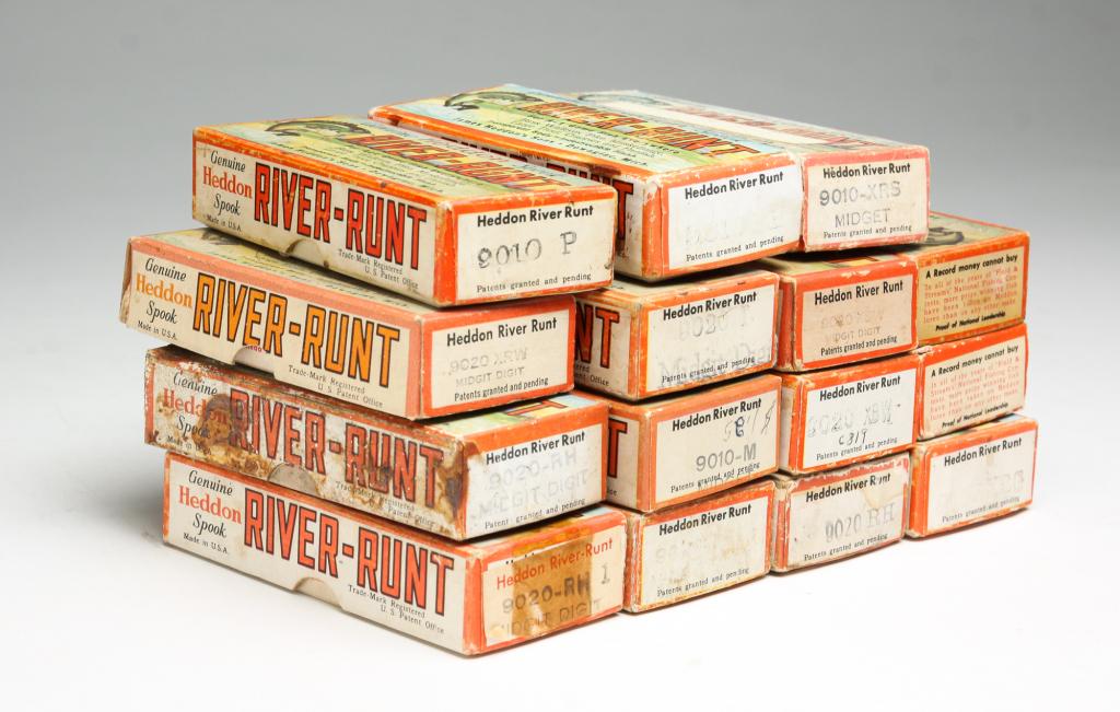 FIFTEEN HEDDON RIVER RUNT MIDGET FISHING LURES: Group of fifteen Heddon River Runt lures. Group includes Midget and Midget Digit lures in original boxes, some with original paper inserts.
