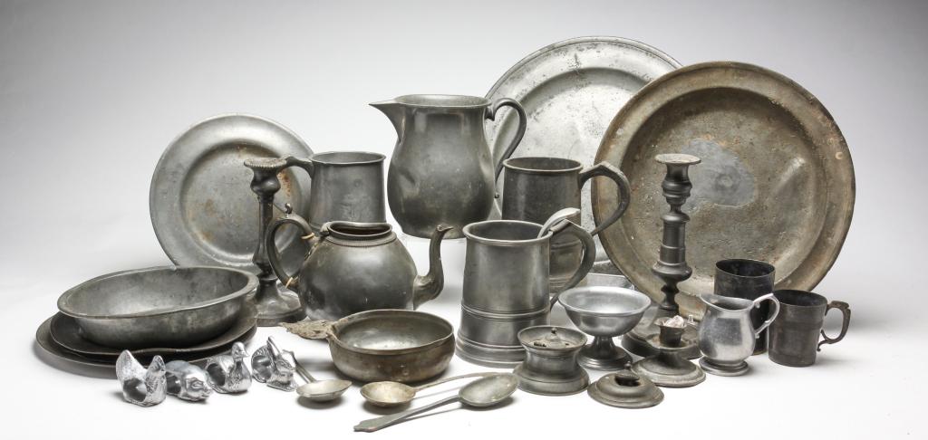 LARGE GROUP OF PEWTER.: American and European, early 19th-late 20th century. Includes basins, chargers, pitcher, candlesticks, teapot, measures, inkwell and porringer with crown handle. Varying wear, loss and damage.