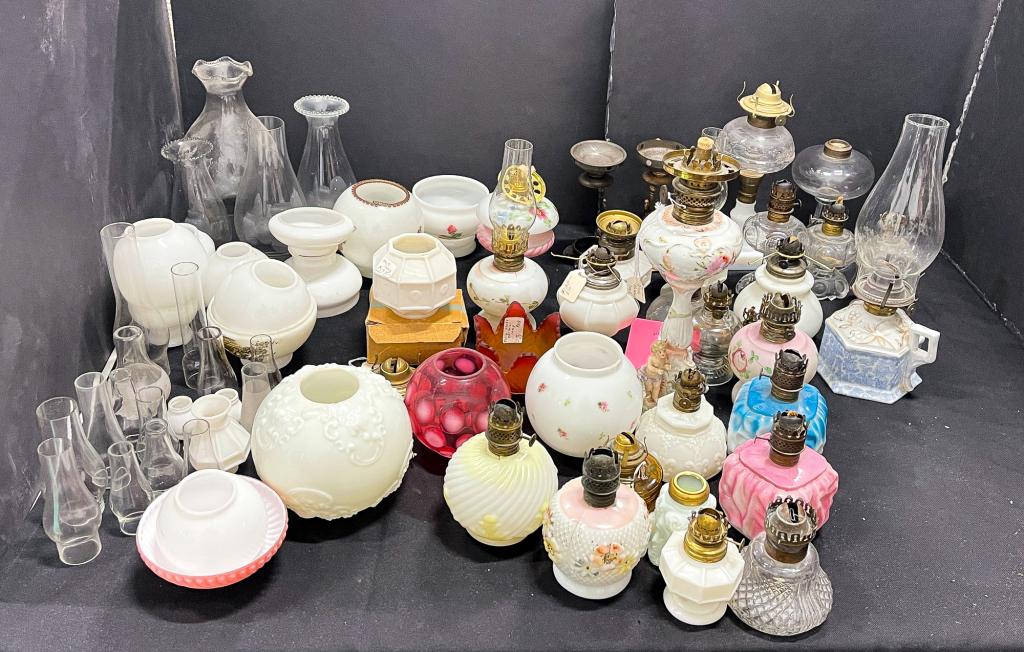COLLECTION OF OIL LAMPS, PARTS AND GLOBES.: American, 19th - 20th century. Including lamp bases, chimneys, globes and inserts. Varying wear and loss.
